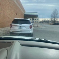 Walgreens - I've been in this line in the same exact place for over 15 minutes to pick up a prescription.