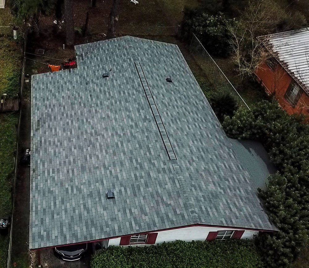 Slide of Action Roofing