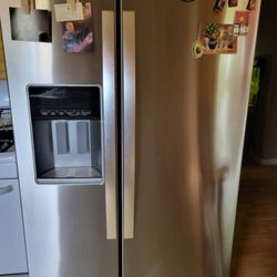 An Appliance Repair And Sales - Whrilpool side by side