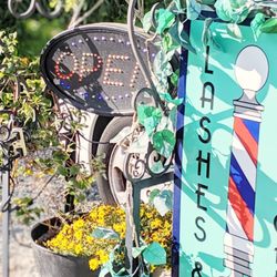 Lashes & Mustaches - Find the sign at 116 S Houston Ave! Schedule an appointment at Lashes & Mustaches!