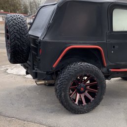 One of their jeeps outside, love the tread on those tires.