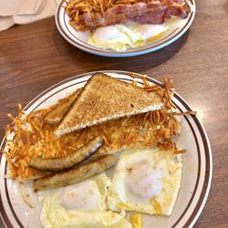 Tim’s Kitchen - The $5 May breakfast special, one w/bacon, other sausage, tasty deal!