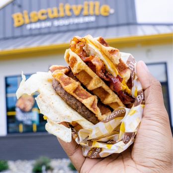 Biscuitville - a hand holding a waffle sandwich - Southern Near Me - Fayetteville, North Carolina