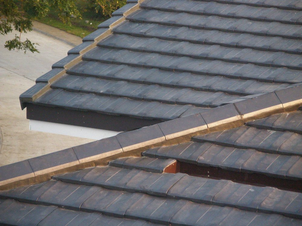 Slide of Progressive Roofing