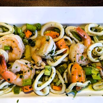 Tuscany Italian Grill Conroe - Seafood Salad - on a bed of mirapoix!? - Italian Near Me - Conroe, Texas Tuscany Italian Grill Conroe - Seafood Salad - on a bed of mirapoix!? - Italian Near Me - Conroe, Texas