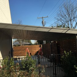 Carportman - Carport with standing seem roof and tongue and groove ceiling