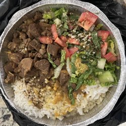 Priya's Roti Shop - Dhal & White rice + curry goat. Well seasoned, scrumptious lentils. The salad with lots of cucumber and tomatoes.