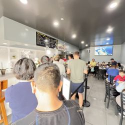 Tho Tuong BBQ - Noon 9.8/24. Almost sold out, line on left takeout, seating line out dooe 8 deep