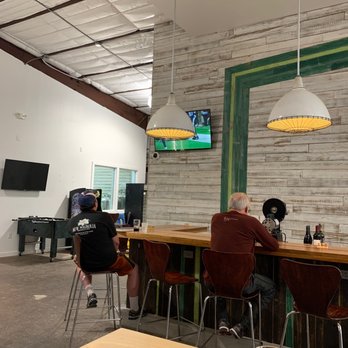New Magnolia Brewing - Why place a light in front of the TV? - Breweries Near Me - Houston, Texas