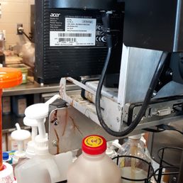  a bottle of liquid on a counter