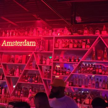 Amsterdam Hallandale - a bar filled with bottles of alcohol - Dance Clubs Near Me - Hallandale Beach, Florida Amsterdam Hallandale - a bar filled with bottles of alcohol - Dance Clubs Near Me - Hallandale Beach, Florida