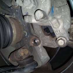 Enterprise Car Sales - Missing Bolt on Caliper for Brake on front tire.