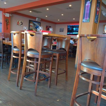Sangria Cafe - Chairs or booths. - Latin American Near Me - Bronx, New York