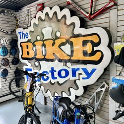 The Bike Factory - The Bike Factory logo sign inside the shop.