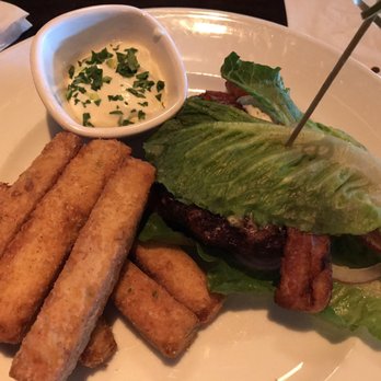 Marlow's Tavern - Black and blue burger on lettuce with a side of chickpea fries - New American Near Me - Orlando, Florida Marlow's Tavern - Black and blue burger on lettuce with a side of chickpea fries - New American Near Me - Orlando, Florida