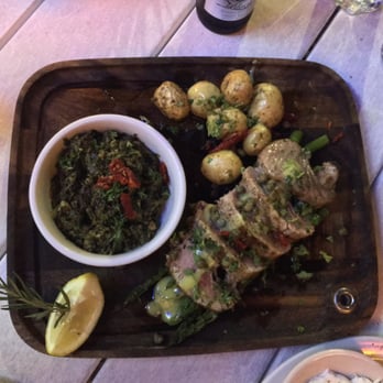 Poseidon - 200g Tuna steak. Medium rare is the best. on the side spinach, potato  and lemon is the best. - Greek Near Me - Miami Beach, Florida