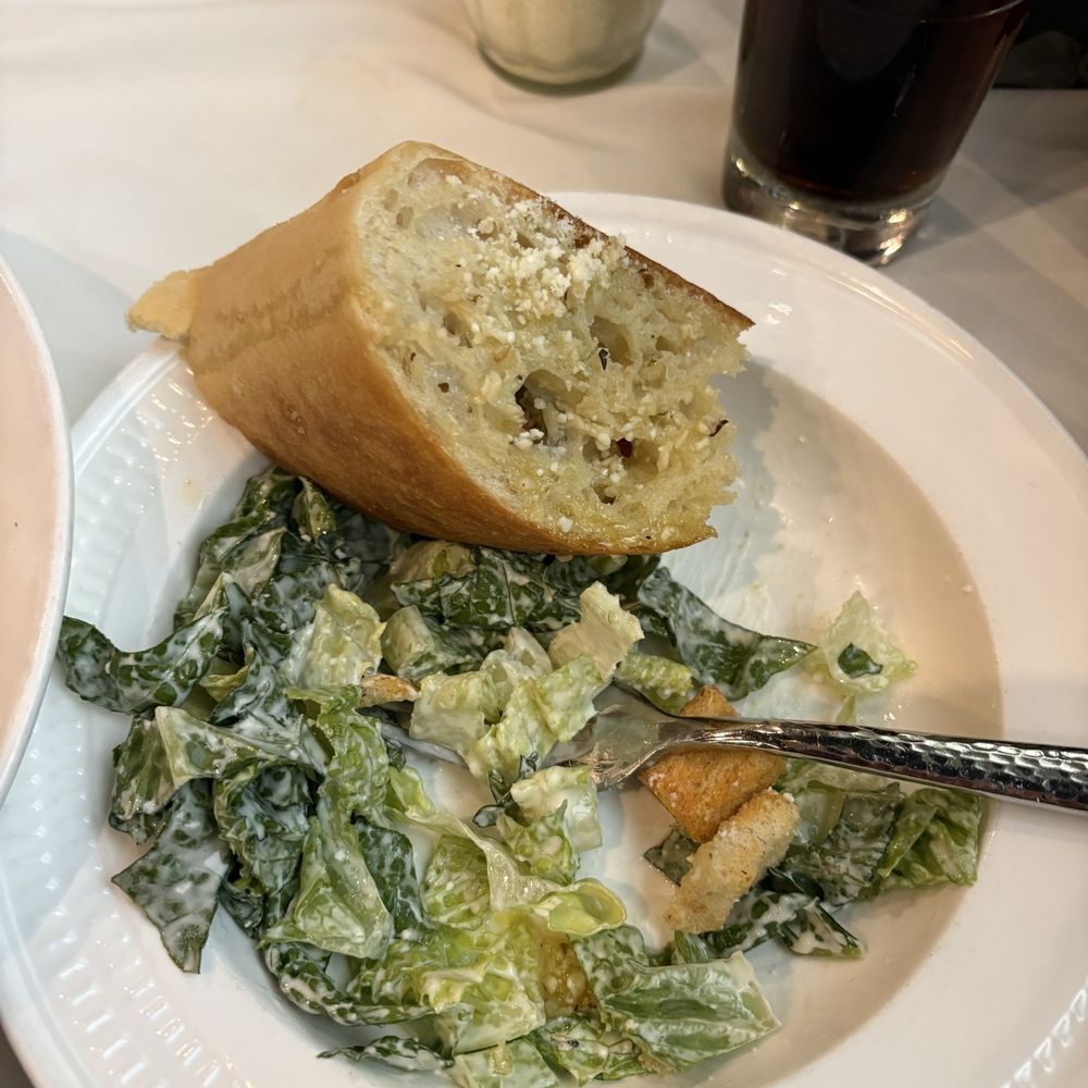 Poppys Italiano - Caesar salad and garlic bread - Italian Near Me - St. Augustine, Florida Poppys Italiano - Caesar salad and garlic bread - Italian Near Me - St. Augustine, Florida