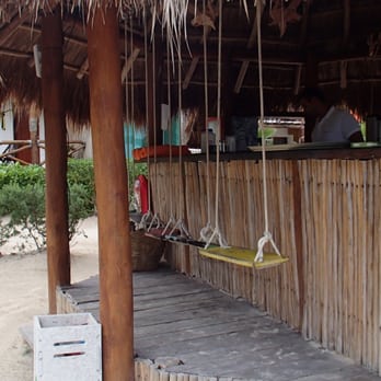 Hotel Villas Flamingos - Take a swing while drinking your margarita or tequila shot - Hotels & Travel Near Me - Holbox, ROO