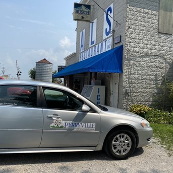 Al's Place - Front of Al's Place with our airport courtesy car - Bars Near Me - Perryville, Missouri