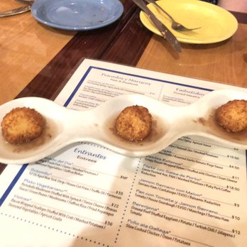 Isabella's - Queso Frito. Goat cheese fritters with almonds and a shallot vinaigrette - Tapas/Small Plates Near Me - Frederick, Maryland