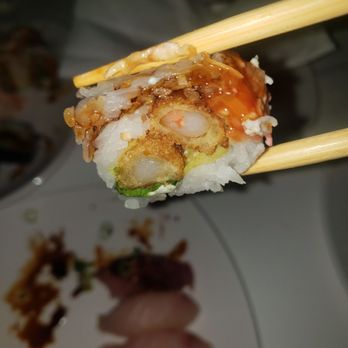 2 Tha Joint Sushi - chopsticks holding a sushi - Sushi Bars Near Me - Reno, Nevada