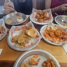 Fried pickles, buffalo shrimp, and boneless wings. Fried pickles, buffalo shrimp, and boneless wings.