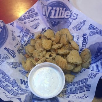 Willie's Grill & Icehouse - Fried pickles!!! Yes was craving these.  I ate most of Before I took the picture.  Oops... But they were good. - American Near Me - Conroe, Texas