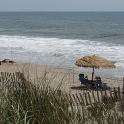 Dolphin Realty - Relaxing day at the beach!