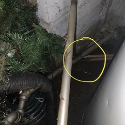Before, pipes were resting on other pipes causing leaking. Before, pipes were resting on other pipes causing leaking.