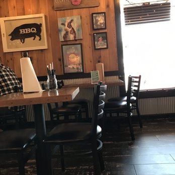 Cockeye Bbq - Comfortable dining room with tables and chairs and booth. - American Near Me - Warren, Ohio