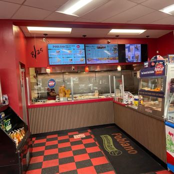 Krispy Krunchy Chicken - With the Poblano counter in the middle, KKC is on the right, and a variety of soft drinks are on the left, including Jarritos :-: - Chicken Shop Near Me - Catonsville, Maryland Krispy Krunchy Chicken - With the Poblano counter in the middle, KKC is on the right, and a variety of soft drinks are on the left, including Jarritos :-: - Chicken Shop Near Me - Catonsville, Maryland