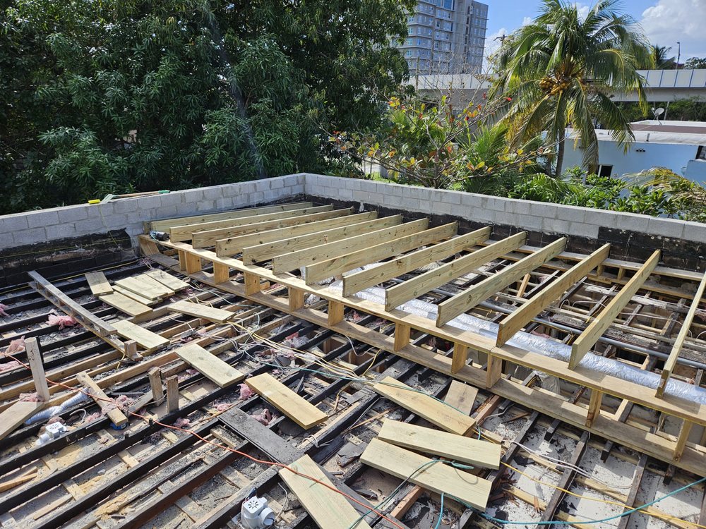 Slide of Sarmiento Roofing Services