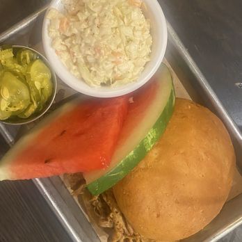 The Smoke Shop BBQ - Seaport - Pulled pork, Cole slaw, pickles and watermelon. - Southern Near Me - Boston, Massachusetts The Smoke Shop BBQ - Seaport - Pulled pork, Cole slaw, pickles and watermelon. - Southern Near Me - Boston, Massachusetts