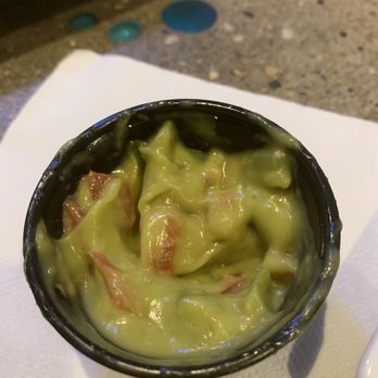 Halfway Down - Tiny container of $4 guacamole looked like green mayo with tomatoes. - Pubs Near Me - Freeport, New York