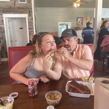 Koop's BBQ Kitchen & Catering - My cousin trying KOOPS fall off the bone rib - Barbeque Near Me - Galveston, Texas Koop's BBQ Kitchen & Catering - My cousin trying KOOPS fall off the bone rib - Barbeque Near Me - Galveston, Texas