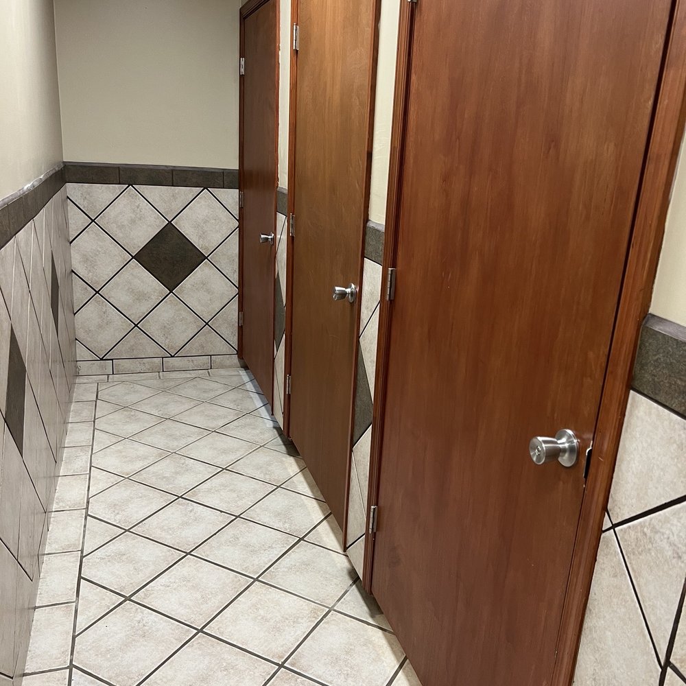 Row of individual shower stalls