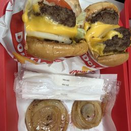 A four by four cheeseburger, a double double cheeseburger, and extra grilled onions on the side! A four by four cheeseburger, a double double cheeseburger, and extra grilled onions on the side!