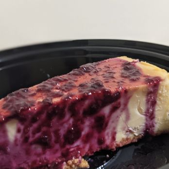 The Moose - My creme brulee cheesecake got a rough ride. It still was yummy! - Pubs Near Me - Woodbridge, Ontario