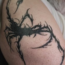 The Zone Tattoo & Body Piercing - What she tattooed.