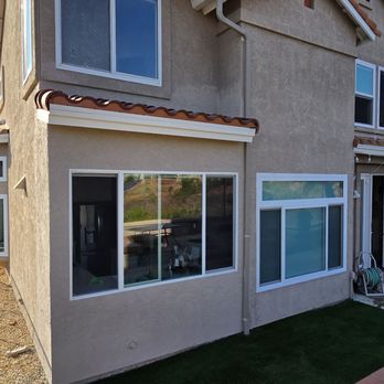 Munster Construction - Glass room removed and replaced - General Contractors Near Me
