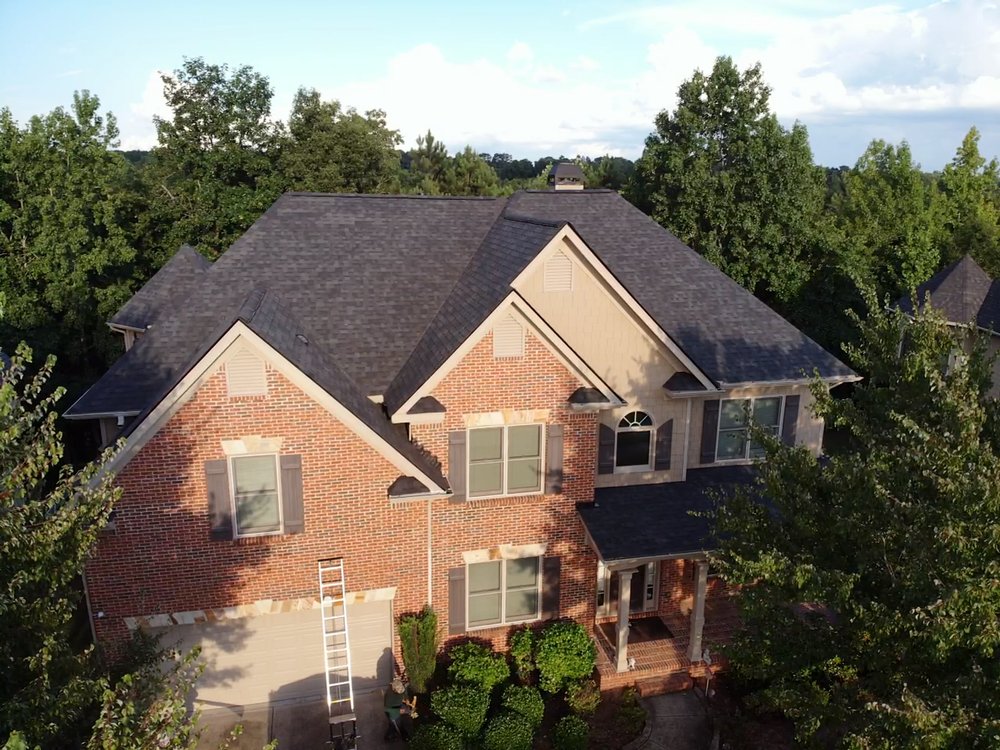 Slide of ER Roofing Specialist