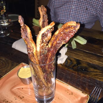 OBC Kitchen - Glass of candied bacon with peanut butter dipping sauce. So much yum! - Salad Near Me - Lexington, Kentucky