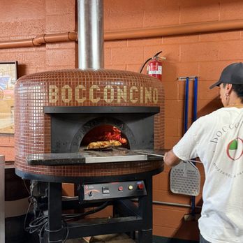 Bocconcino Hawaii - Wood fired oven making our pizzas, while we sat watching and enjoying a beer. - Pizza Near Me - Honolulu, Hawaii