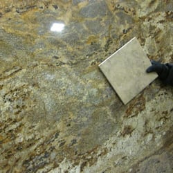 Mont Surfaces by Mont Granite - The tile isn't from here but the beautiful granite sure is!