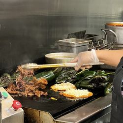 EL SOL Carniceria - Birria tacos on the flat top