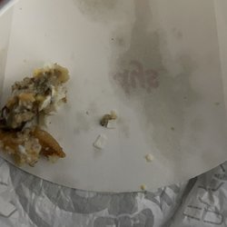 Wendy's - Egg shell in sausage, egg and cheese breakfast sandwich.