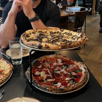 Young Joni - The Unami Mama (top), amalfi coast (bottom), perfect pickle pie (far left) - Pizza Near Me - Minneapolis, Minnesota Young Joni - The Unami Mama (top), amalfi coast (bottom), perfect pickle pie (far left) - Pizza Near Me - Minneapolis, Minnesota