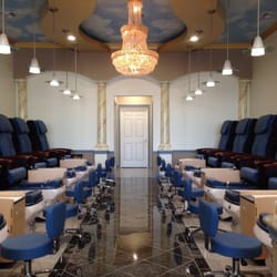 Cosmo Nail Bar - Beautiful decoration with chandelier, lights and sky painting.