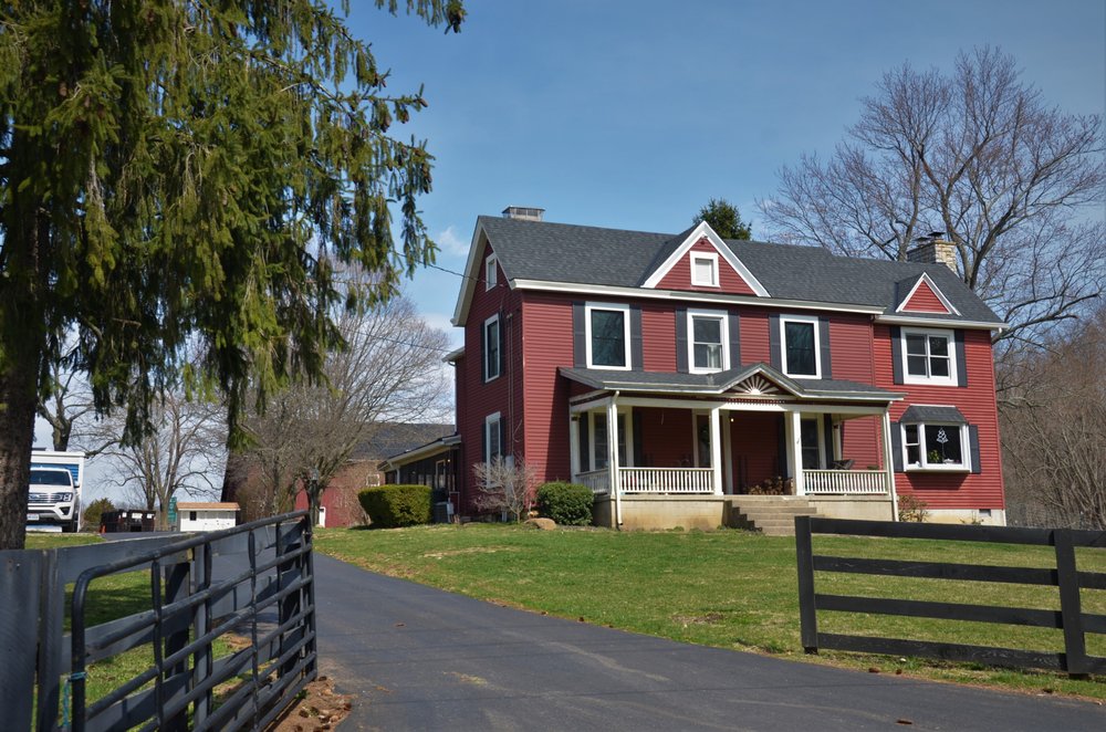Slide of Caliber Roofing