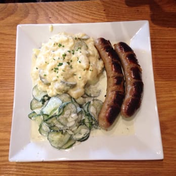 Max Bratwurst und Bier - Berlin potato salad and cucumber salad with farmer's sausage hot with jalapeño pepper sausage - German Near Me - Astoria, New York Max Bratwurst und Bier - Berlin potato salad and cucumber salad with farmer's sausage hot with jalapeño pepper sausage - German Near Me - Astoria, New York